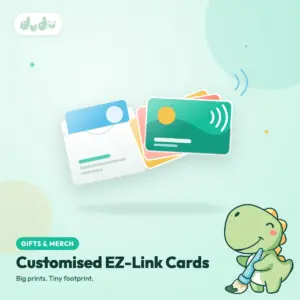 Custom-printed EZ-Link transit cards in a colourful fan with a paper gift sleeve