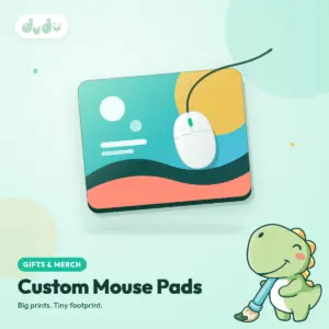 Custom printed mouse pad with a colourful full-bleed design next to a computer mouse