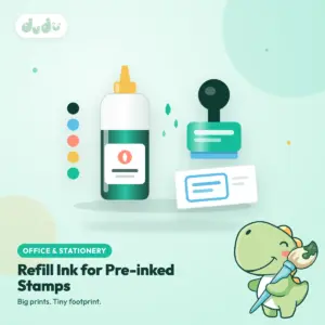 Bottle of refill ink with a nozzle cap beside a pre-inked rubber stamp and ink drops