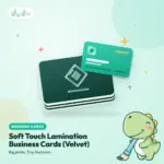 Stack of velvet soft touch laminated business cards with glossy spot UV highlights