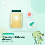 Clear die-cut stickers on a glass jar and loose custom-shaped transparent stickers